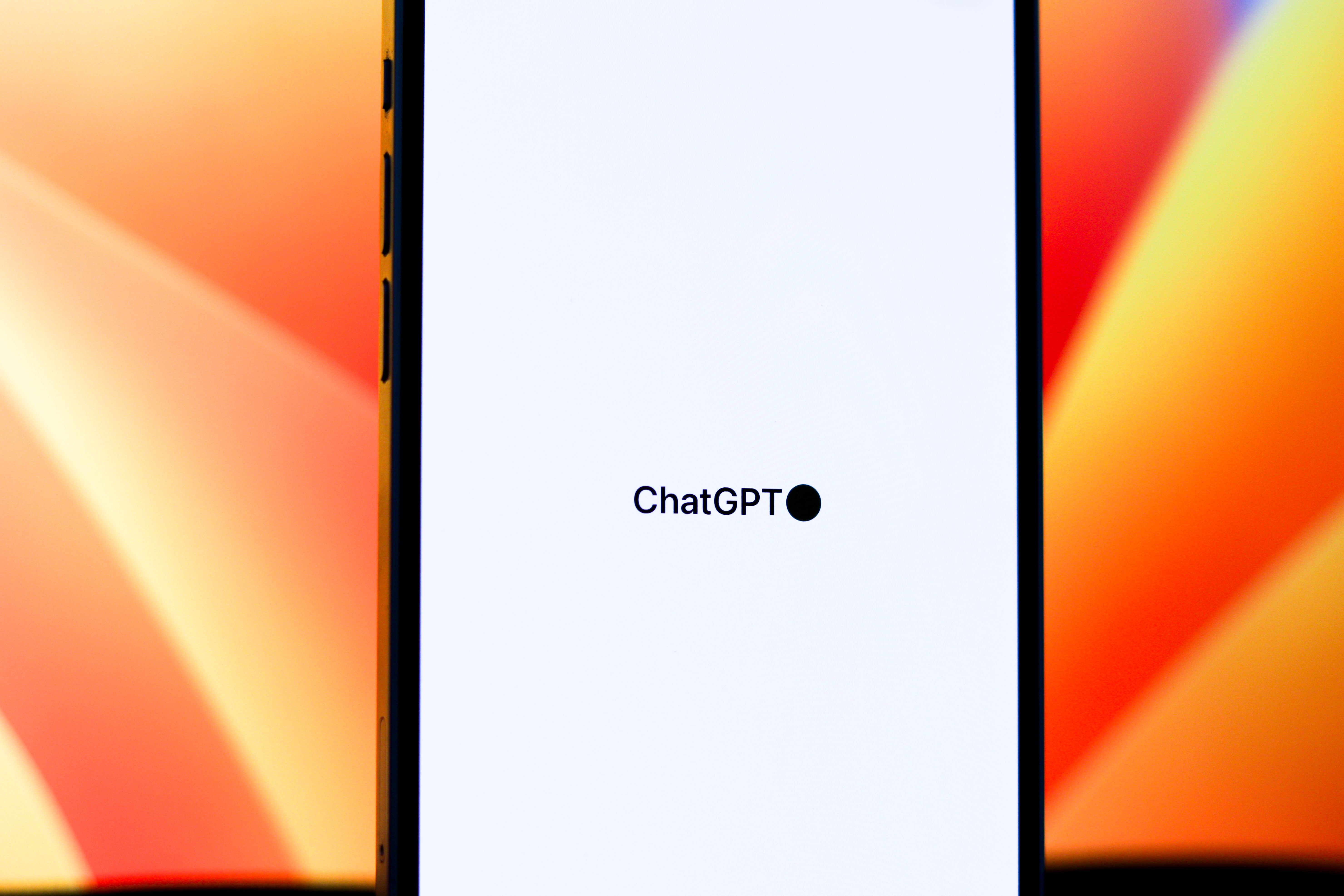 Smartphone displaying an AI chatbot app for rewriting and paraphrasing everyday writing